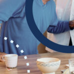 senior getting help from a caregiver