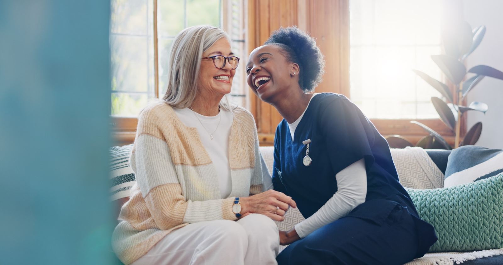 CorsoCare caregiver helping senior woman at home